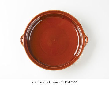 Empty Casserole Dish On White Background