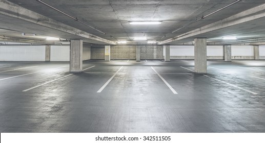 empty cement Parking Garage interior in the mall.