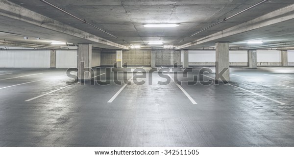 empty cement\
Parking Garage interior in the\
mall.
