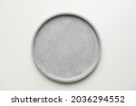 Empty ceramic plate, gray round tray plate isolated on white background with clipping path
