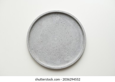 Empty ceramic plate, gray round tray plate isolated on white background with clipping path