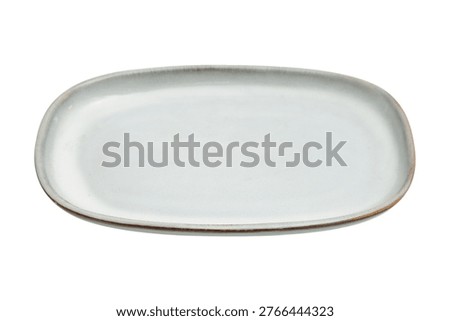 Empty ceramic plate on white background. Minimalist oval serving dish for food presentation. Modern stoneware platter for restaurant or home dining table setting, isolated object.