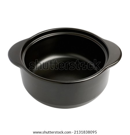 Empty ceramic saucepan with black enamel finish isolated on white background