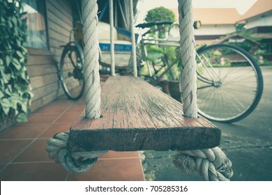 Empty chain swing in playground. Image of children swing.