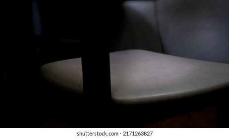 empty chair in dark room