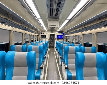 Empty chair of executive class of a train before departure time.