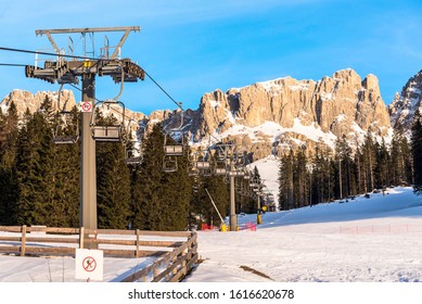 Empty Chair Lift In The Dolomites On A Clear Winter Day