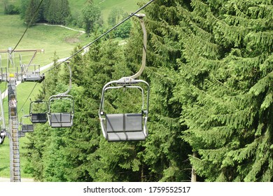 Empty Chair Lift To The Top Of The Mountain