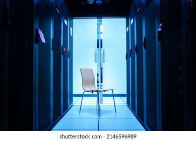  empty chair in the server room represents a job title. - Powered by Shutterstock