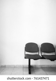Empty Chair and Empty Wall