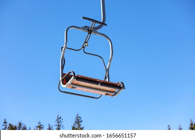 Empty Chairlift At Mountain Ski Resort. Winter Vacation