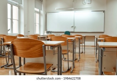 Empty Chairs And Tables In Classroom  No People In School Classroom 