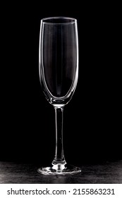 Empty Champagne Flute On Black Background