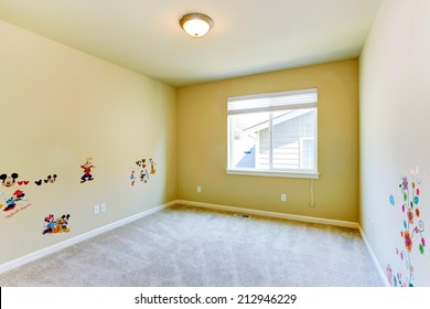 Empty Cheerful Kids Room With Painted Walls