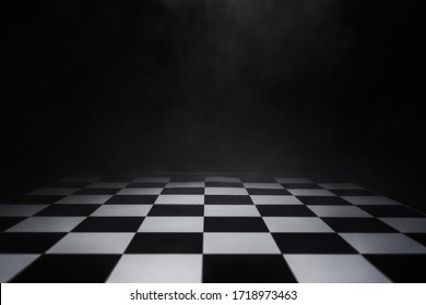 empty chess board with smoke float up on dark background