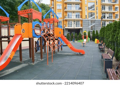 Empty Children's Playground In Vozdvyzhenska Street, Podil District, Kyiv, Ukraine. Space For Text. 