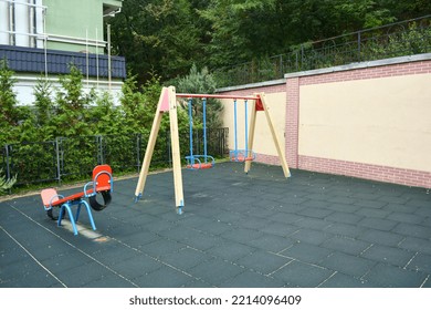 Empty Children's Playground In Vozdvyzhenska Street, Podil District, Kyiv, Ukraine. Space For Text. 