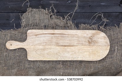 Empty Chopping Board On Wooden Table, Cheese Background Concept, Top View