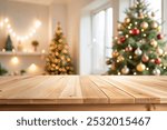 empty christmas table background with christmas tree out of focus for product display montage