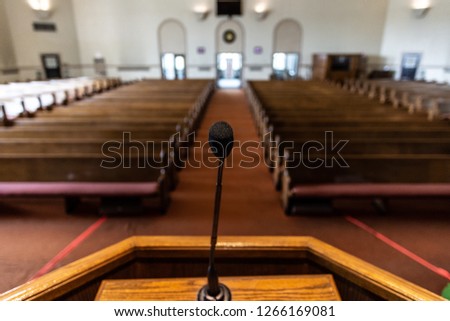 empty church sanctuary view from the pulpit and microphone