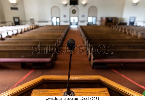 empty church sanctuary view from the pulpit\
and microphone
