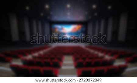 Empty Cinema Hall with Large Screen and Red Seats with Modern Auditorium View.