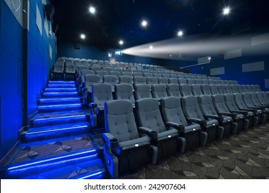 Empty cinema seat with blue environment