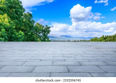 Empty City Square And Green Tree With Modern City Skyline Scenery