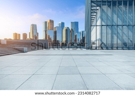 Empty city square and skyline with modern buildings background