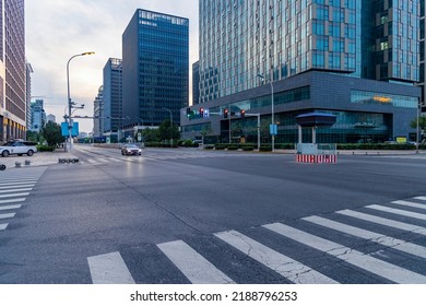 Empty City Streets And White Line Crossings