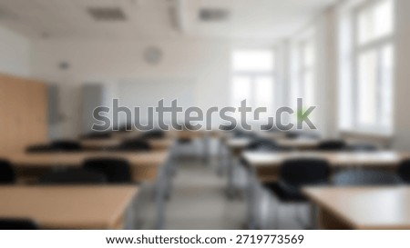 Empty Classroom Rows Awaiting Students with Bright Natural Light Fills Room.