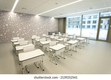 Empty Classroom In School Or University - Chairs And Desks Without Anyone. All Room In White Colour