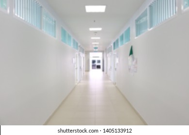 Empty clean hallway or corridor of interior building blurred image for background.