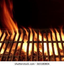 Empty And Clean Hot Flaming Charcoal Barbecue Grill With Bright Flame Isolated On Black Background. Party, Picnic, Braai, Cookout Concept - Shutterstock ID 365180804