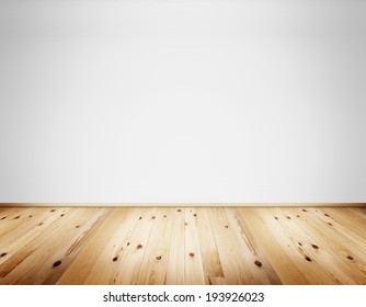 Empty clean interior with white wall and natural wooden rustic floor - Shutterstock ID 193926023