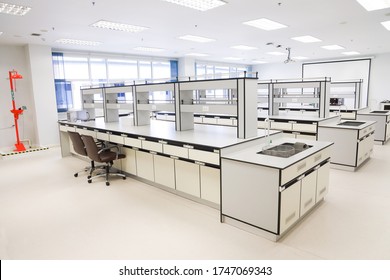 Empty clean laboratory with new furniture at school science classroom interior or university college. Laboratory casework with basin for chemistry and environmental experimental in laboratories room.