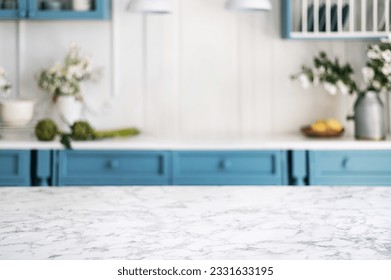 Empty   clean marble dining table in scandinavian kitchen  Modern monochrome interior and blue drawers wooden furniture  Tablewear   vases and flowers 