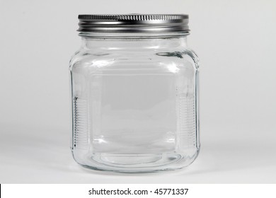 Empty Clear Glass Jar With Screw Lid.