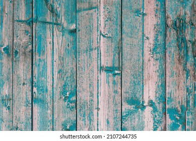 Empty clear old painted wooden background with vertical stripes, copy space. Old fashioned wood texture with scratches and scrapes. Green colored photo filter