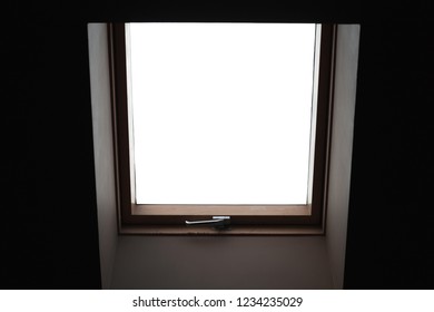 Empty closed window in dark ceiling with white background