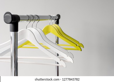 grey wooden coat hangers