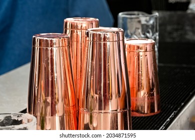 Empty Cocktail Shakers Standing On A Bar. No People.