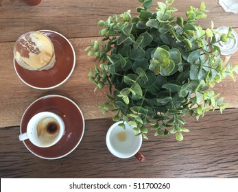 Empty coffee cup after drink on wooden table