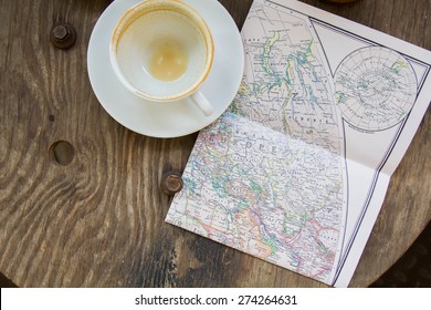 Empty Coffee Cup And The Old Map, Europe And Travel - Top View