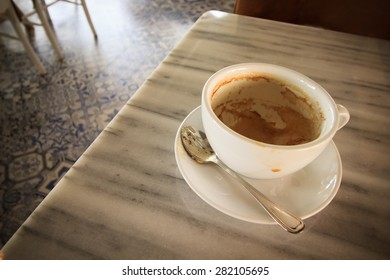 Empty coffee cup on table