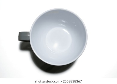 Empty coffee mug. Top view. Isolated on white background