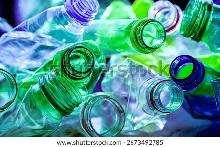Empty colored drink bottles. Recyclable plastic waste.
