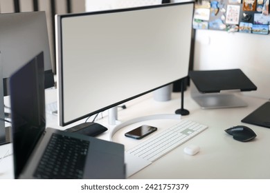 Empty computer monitors. Screen mockup. Home office studio. Workplace interior.
