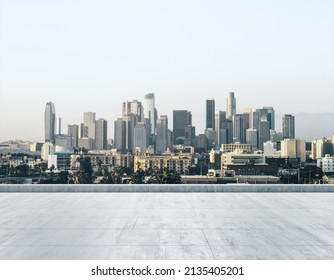 Empty Concrete Dirty Rooftop On The Background Of A Beautiful LA City Skyline At Morning, Mock Up