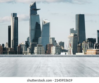 Empty concrete dirty rooftop on the background of a beautiful NY city skyline at daytime, mock up
